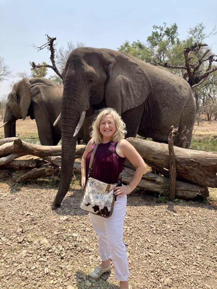 Kathy on safari with elephants in Africa